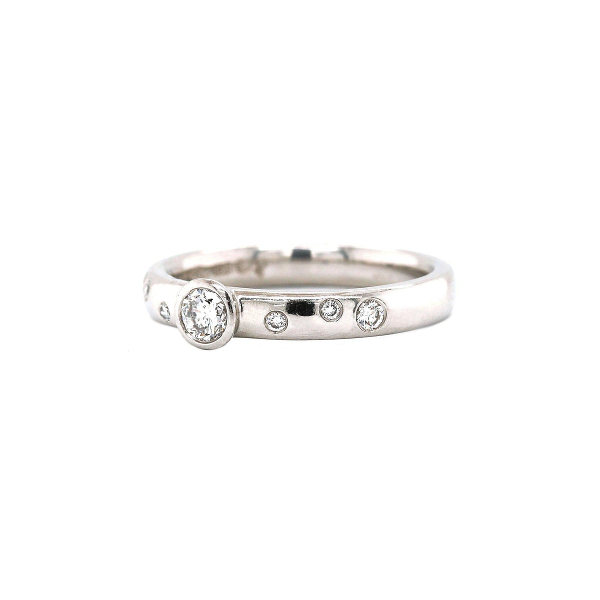 Platinum Bezel Set Inset Scattered Diamond Band