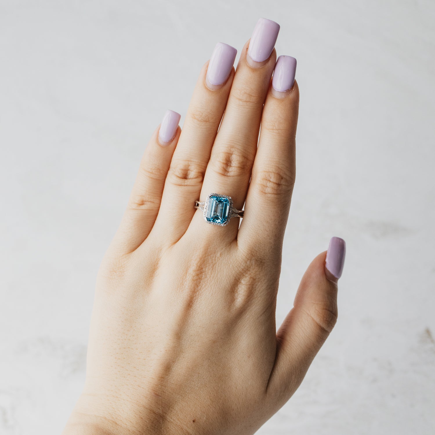 Swiss Blue Topaz Diamond Halo Ring