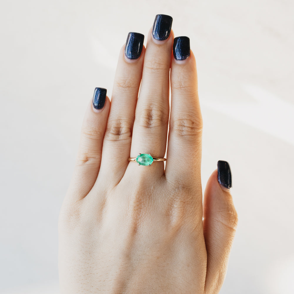 East-West Oval Emerald Solitaire Ring