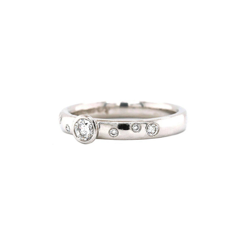 Platinum Bezel Set Inset Scattered Diamond Band