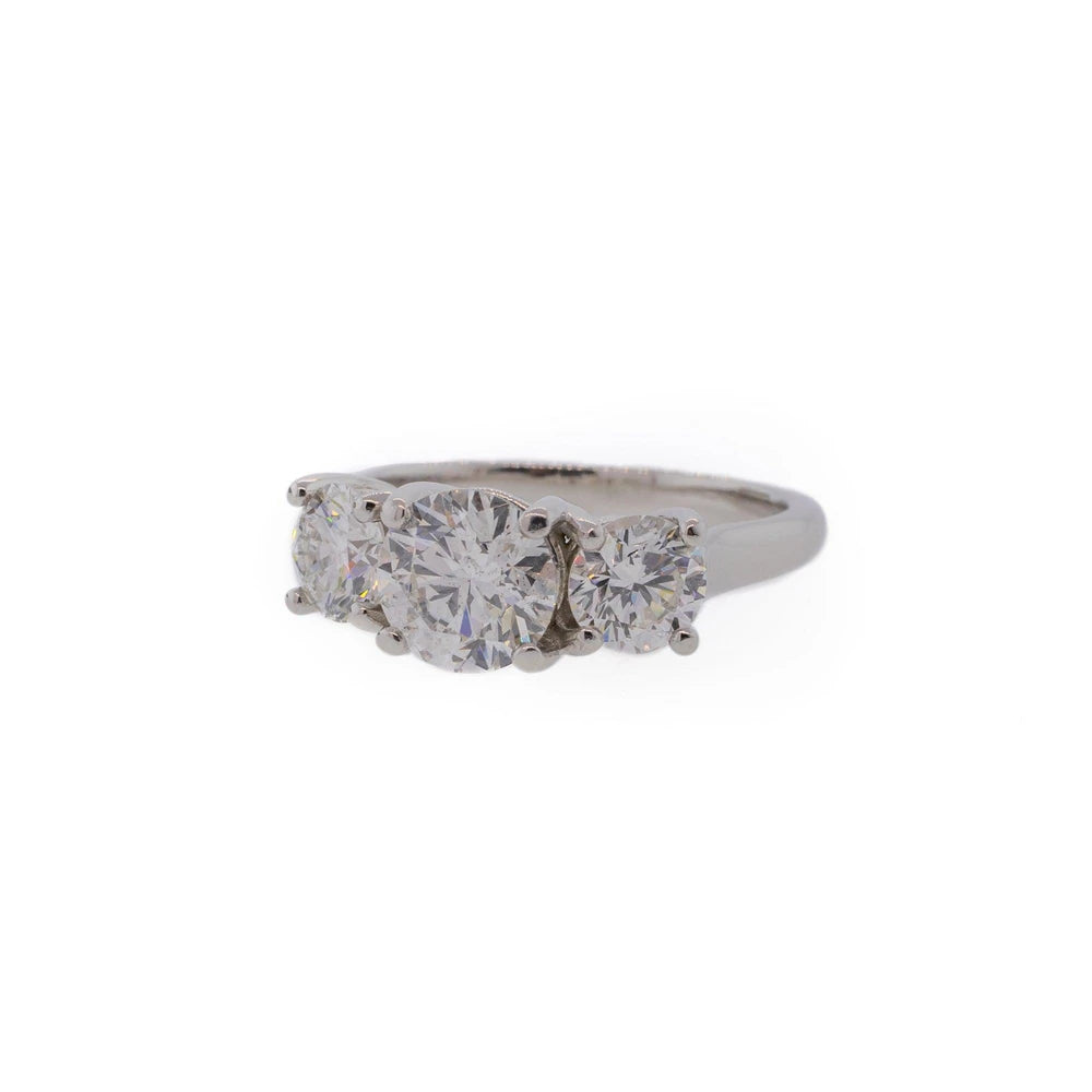 Three-Stone Round Brilliant Diamond & Platinum Engagement Ring