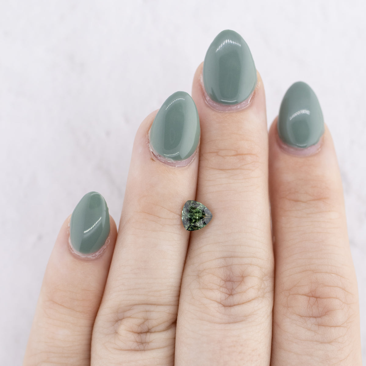 -1.11ct Trillion Cut Natural Teal Sapphire