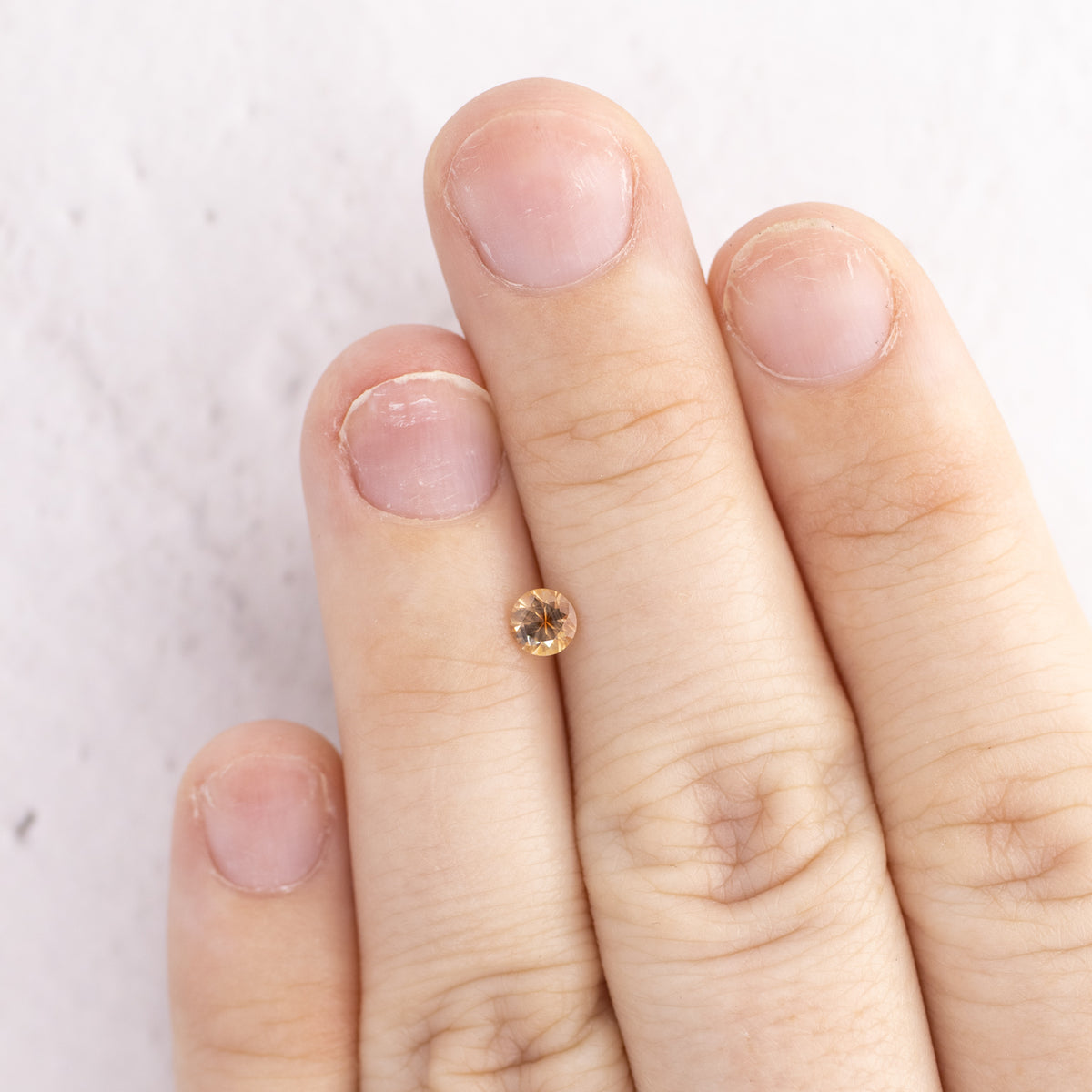 -0.30ct Round 4mm Orange/Peach Montana Sapphire