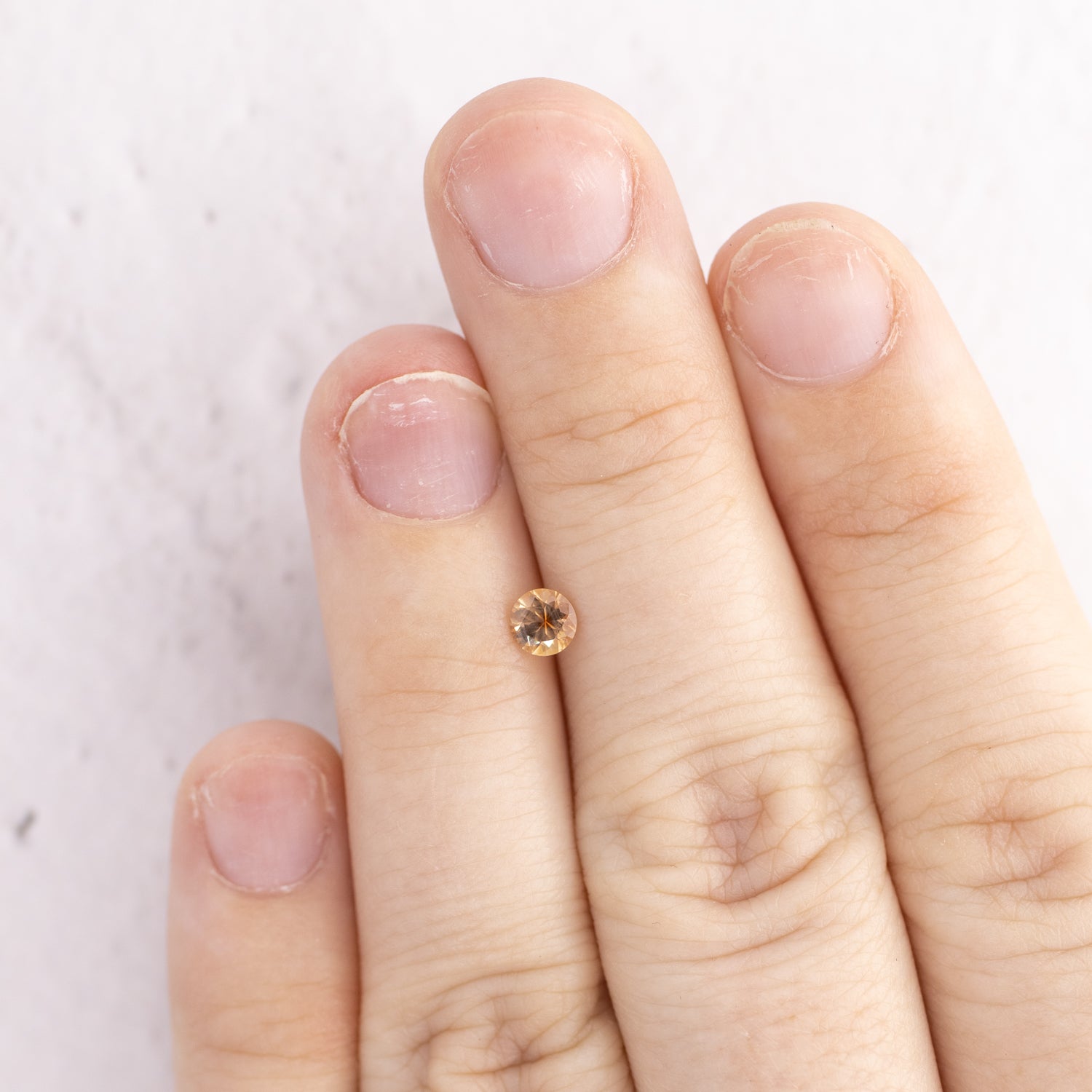 -0.30ct Round 4mm Orange/Peach Montana Sapphire