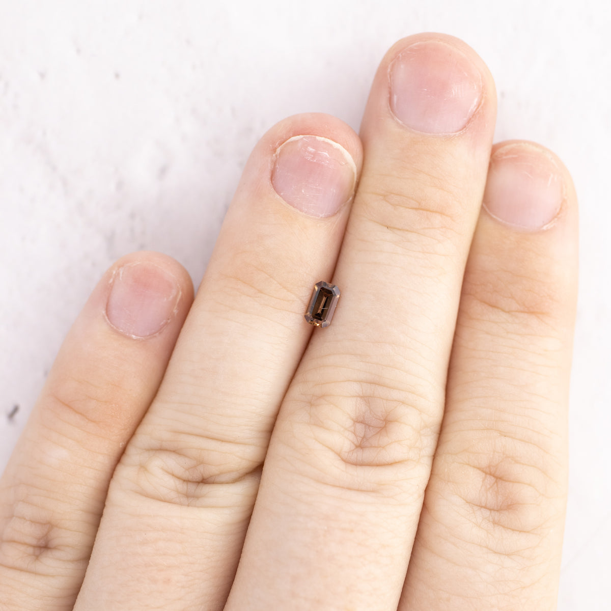 0.36ct Untreated Emerald Cut Redish Brown Sapphire