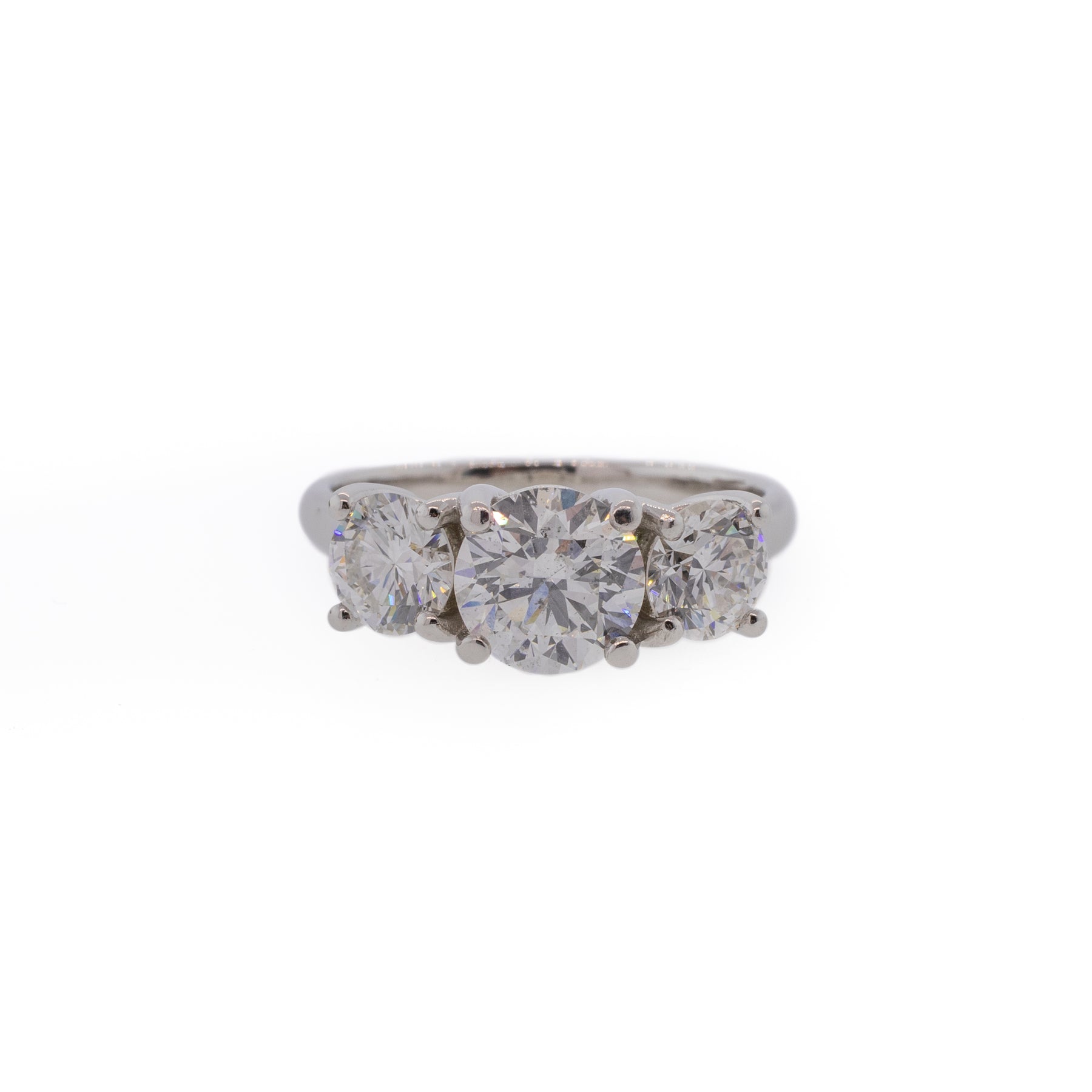 Three-Stone Round Brilliant Diamond & Platinum Engagement Ring