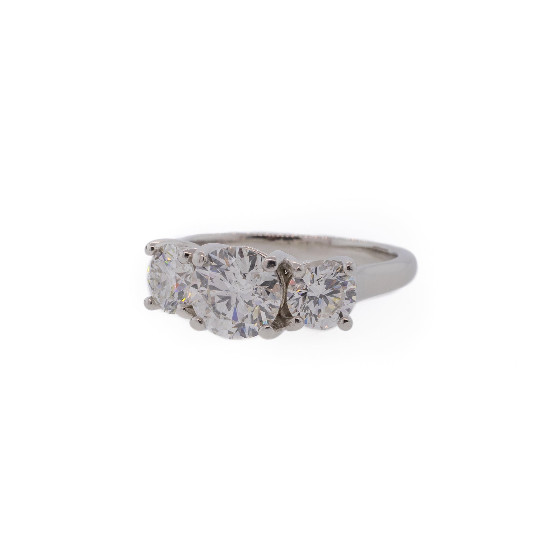 Three-Stone Round Brilliant Diamond & Platinum Engagement Ring