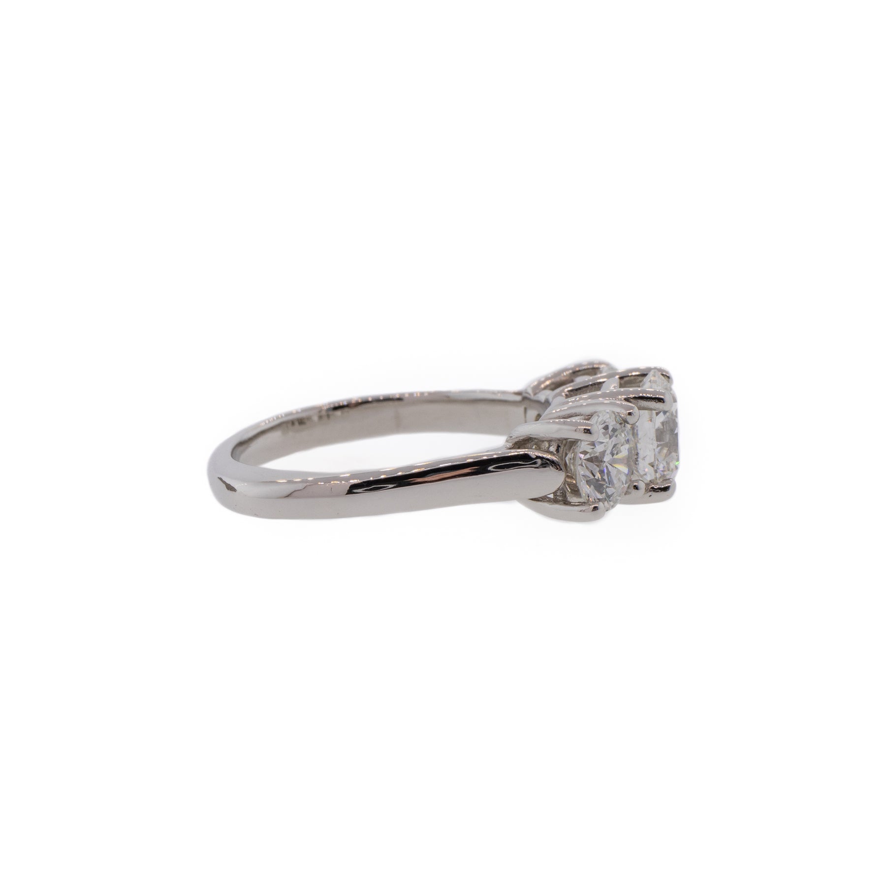 Three-Stone Round Brilliant Diamond & Platinum Engagement Ring