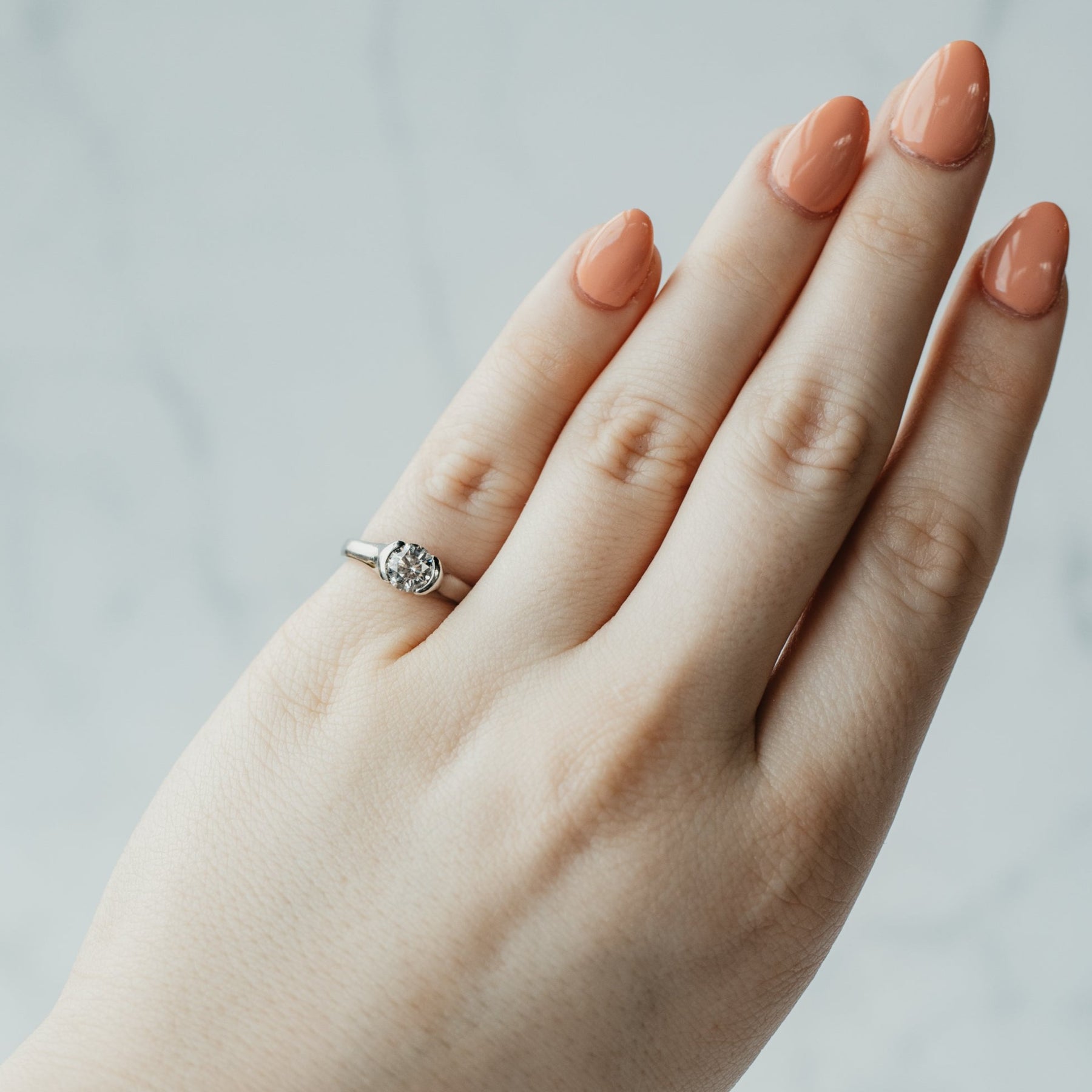 Partial-Bezel Platinum Diamond Solitaire Ring