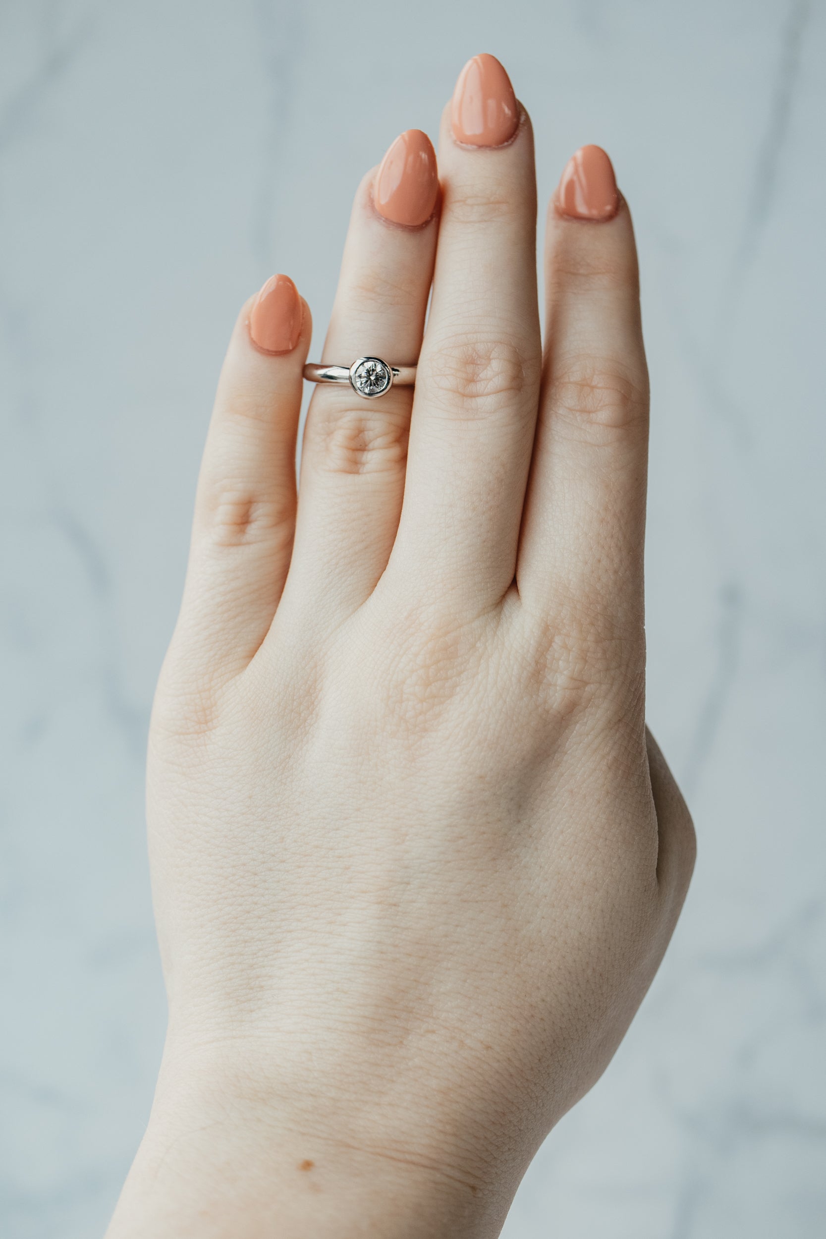 Platinum Bezel-Set Round Brilliant Diamond Solitaire Ring