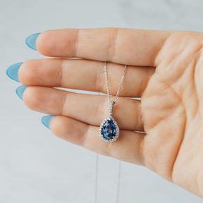 Pear Cut Tanzanite and Diamond Halo Pendant Necklace