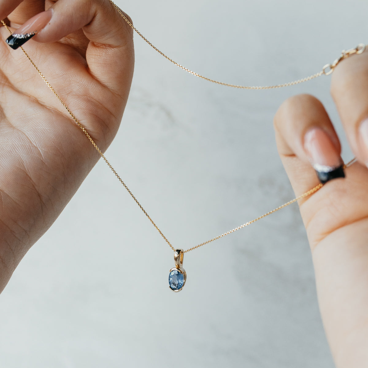 Light Blue Oval Sapphire Pendant Necklace