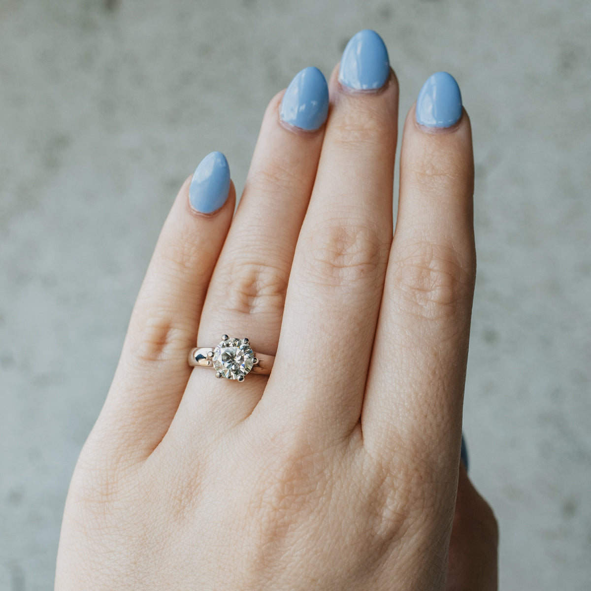 Near Colorless Moissanite Solitaire Ring