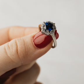 Deep Blue Sapphire & Diamond Halo Ring