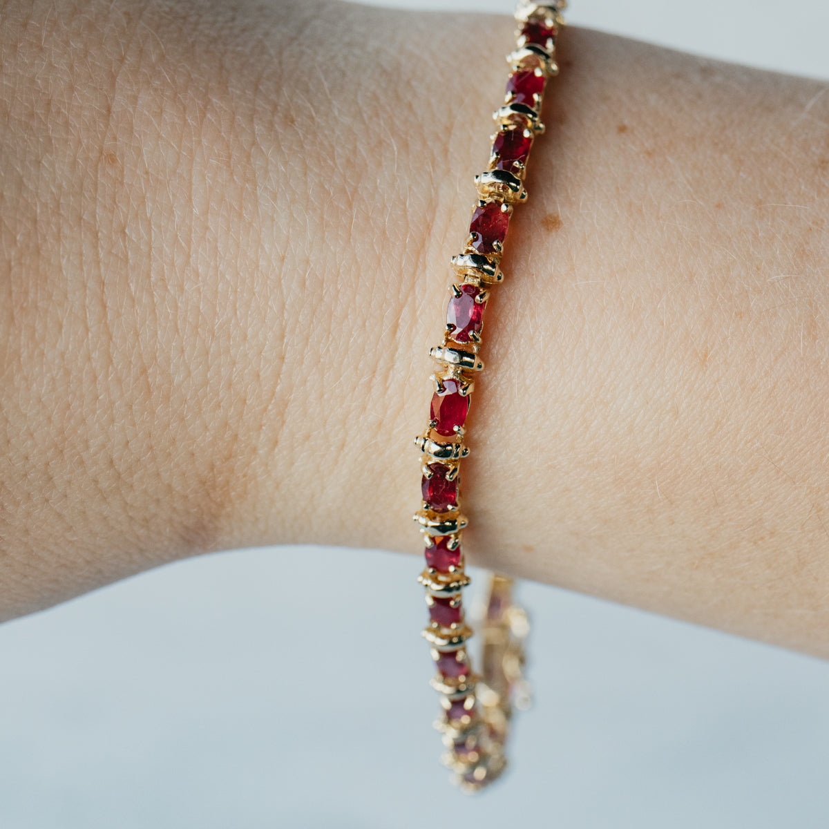 14K Yellow Gold Natural Oval Ruby Line Bracelet