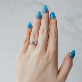 Channel-Set Accented Solitaire Diamond Engagement Ring