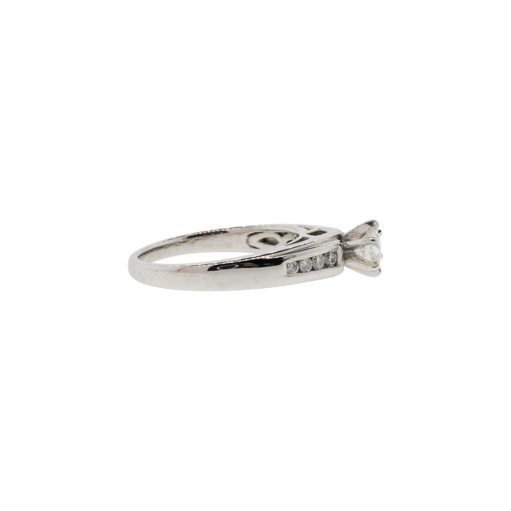 Channel-Set Accented Solitaire Diamond Engagement Ring