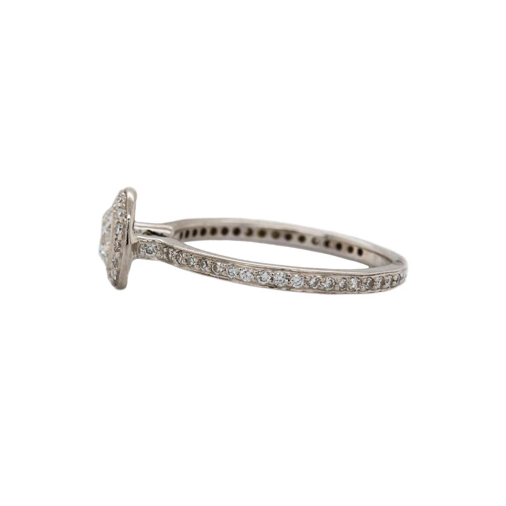 0.76ctw Diamond Halo Engagement Ring