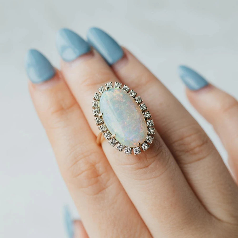 14K Yellow Gold Elongated Oval Opal & Diamond Halo Ring