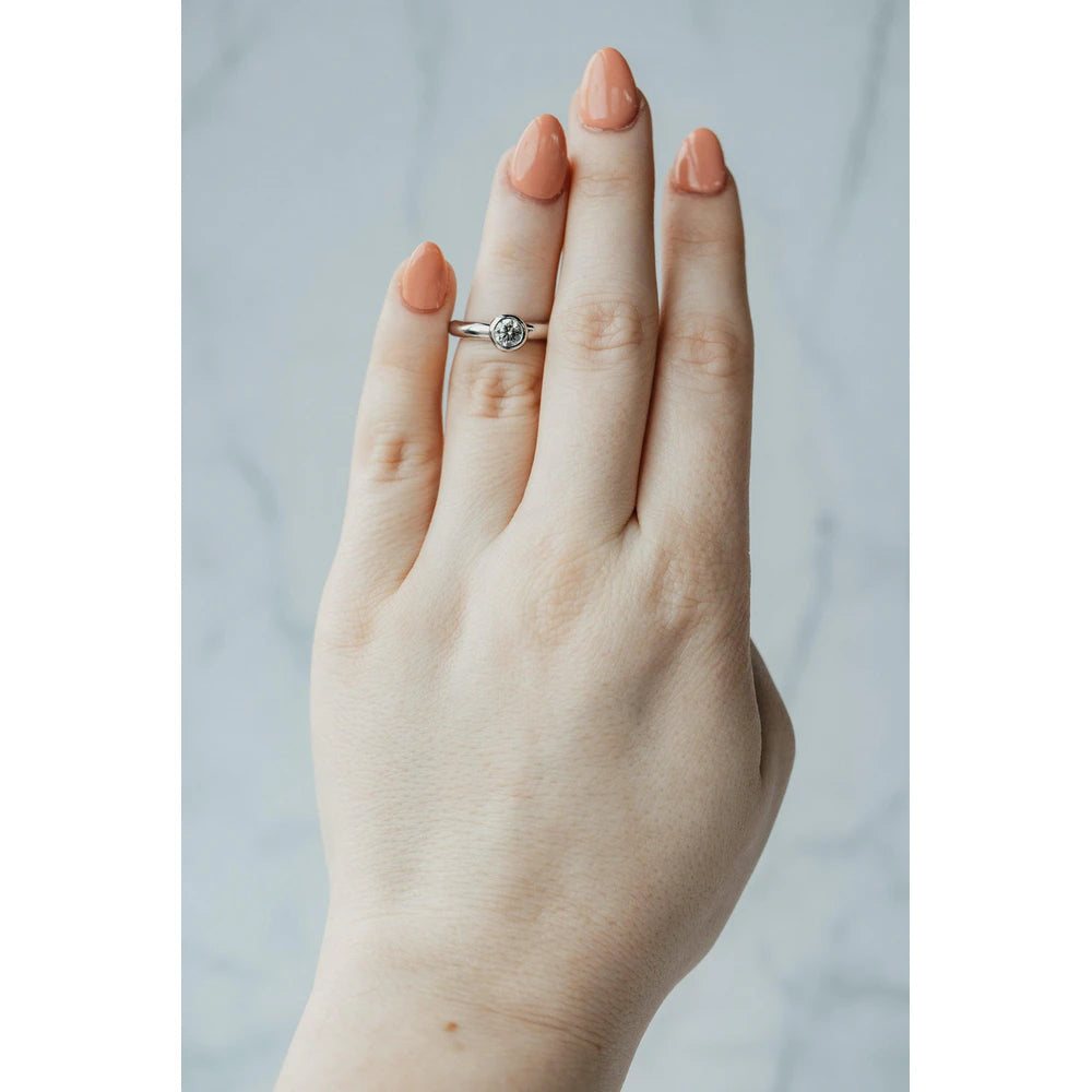 Platinum Bezel-Set Round Brilliant Diamond Solitaire Ring