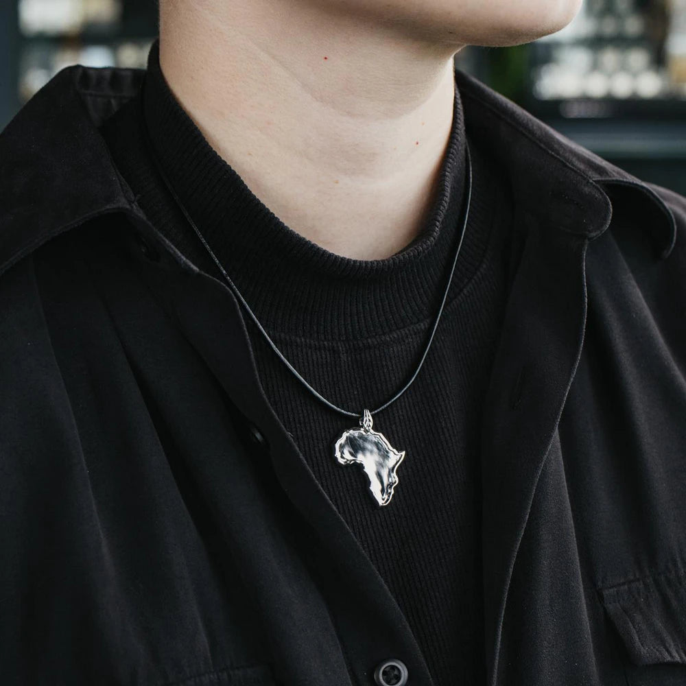 Sterling Silver African Pendant Necklace In High Polish