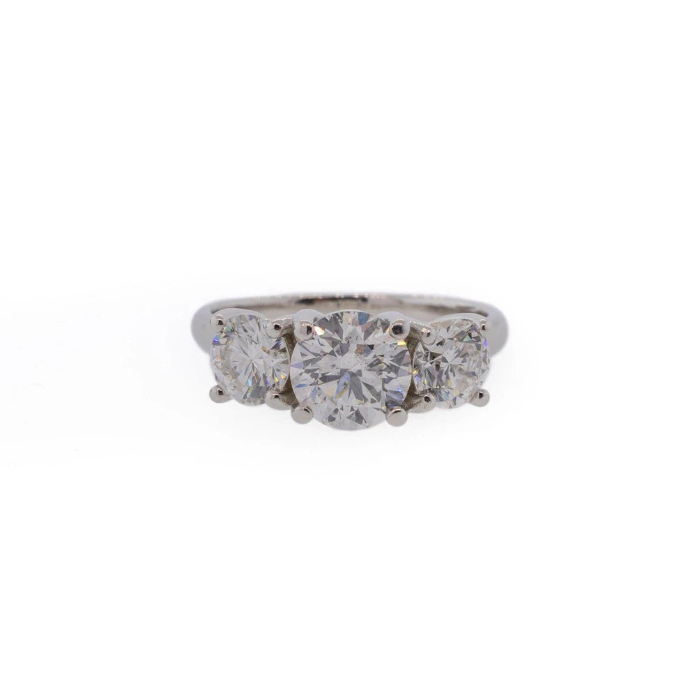 Three-Stone Round Brilliant Diamond & Platinum Engagement Ring