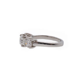 Three-Stone Round Brilliant Diamond & Platinum Engagement Ring
