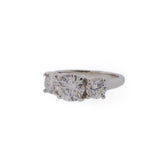 Three-Stone Round Brilliant Diamond & Platinum Engagement Ring