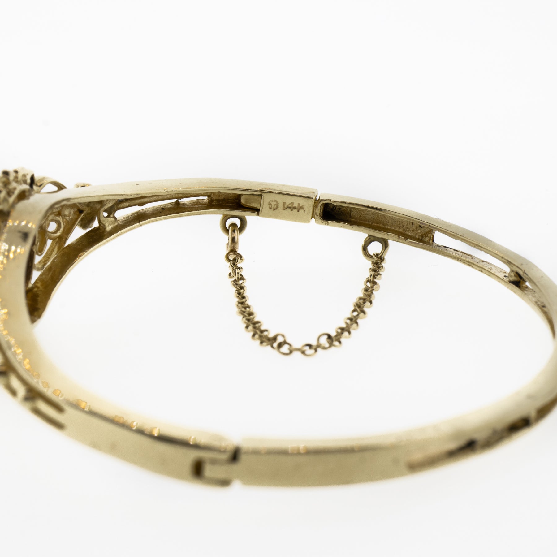 Tiffany T T1 narrow diamond hinged bangle in 18k gold, medium. | Tiffany &  Co.