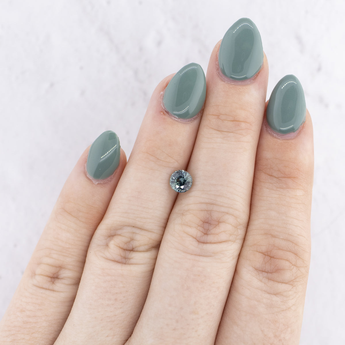 0.90ct Teal Bicolor Round Natural Sapphire