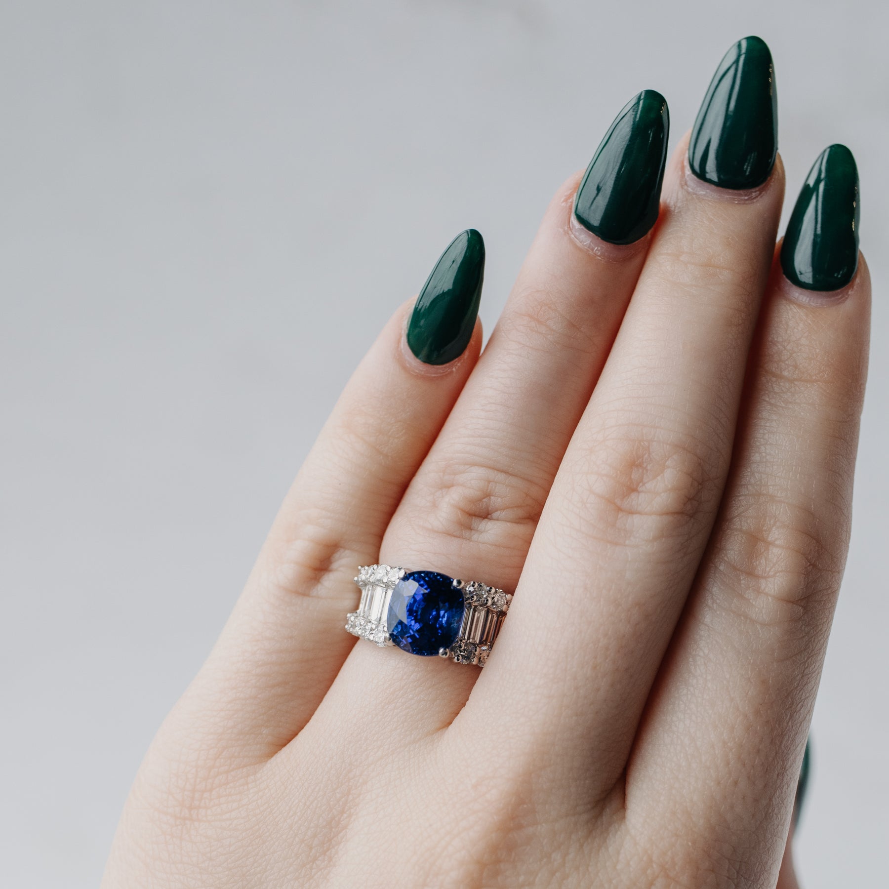 Platinum 5.85 Carat Blue Sapphire and Baguette Diamond Ring