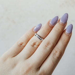 Baguette And Princess Cut White Gold Diamond Band