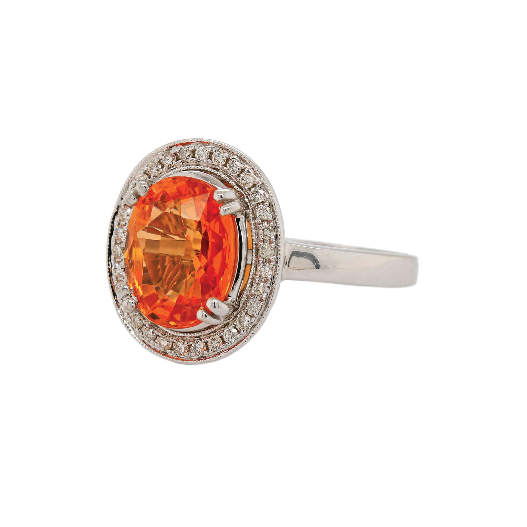 Oval Mandarin Orange Garnet and Diamond Halo Ring